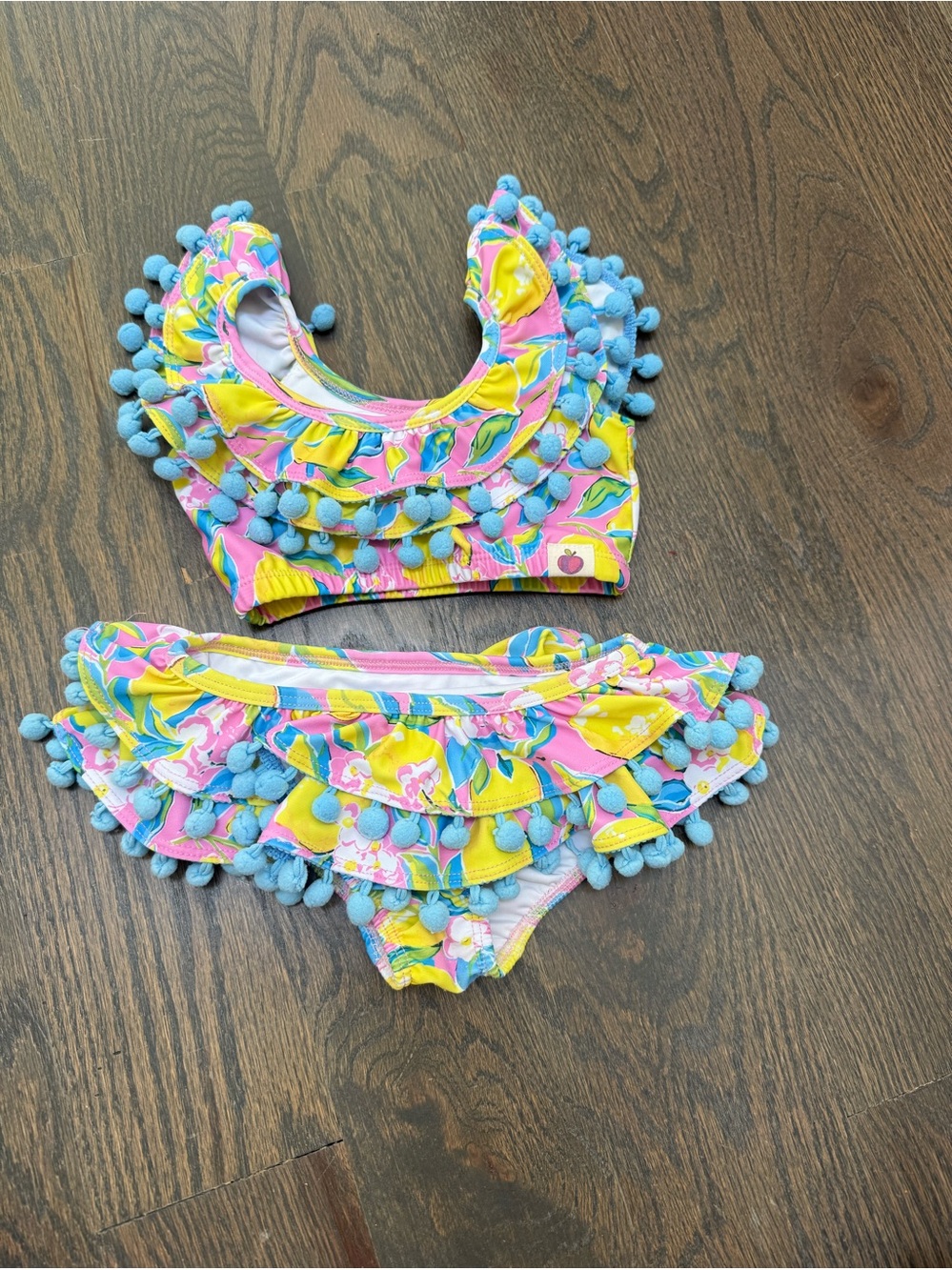 Cheeky Plum Girls Pom-Pom Floral Two-Piece Swim Set in Pink, Yellow & Blue